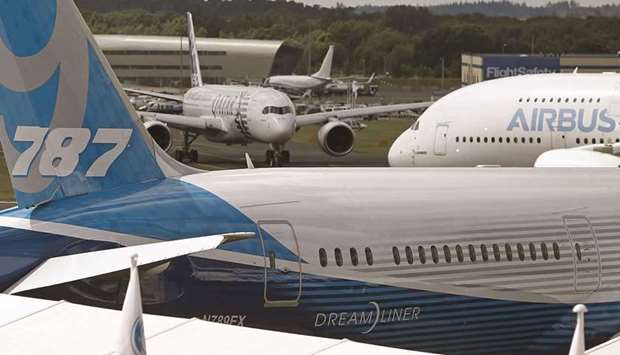 An Airbus A380 aircraft taxis past a Boeing 787-9 Dreamliner before performing in an aerial flying display at the Farnborough International Airshow (file). Britain and the US had been battling since 2004 at the World Trade Organisation over subsidies for US planemaker Boeing and European rival Airbus, which each claimed to have been damaged by unfair competition.