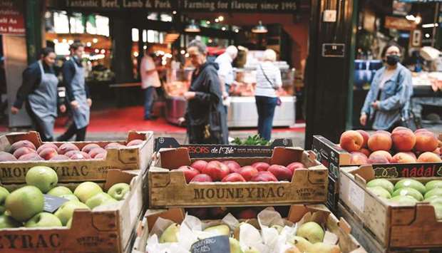 Apples for sale on display in Borough Market in London. The volume of goods sold in stores and online fell 1.4%, according to Office for National Statistics figures published yesterday.