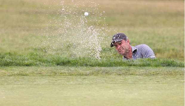 Richard Bland of England plays a shot from a bunker on the eighth hole during the second round of the 2021 US Open at Torrey Pines Golf Course in San Diego, California. (Getty Images/AFP)