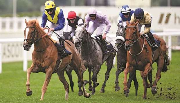 Jockey Ryan Moore (left) rides Dream of Dreams to victory in the Diamond Jubilee Stakes on the fifth day of the Royal Ascot meeting, in Ascot, England, yesterday. (AFP)