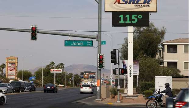 A digital sign displays a temperature of 115 degrees Fahrenheit as a heat wave continues to bake the Southwest United States in Las Vegas, Nevada