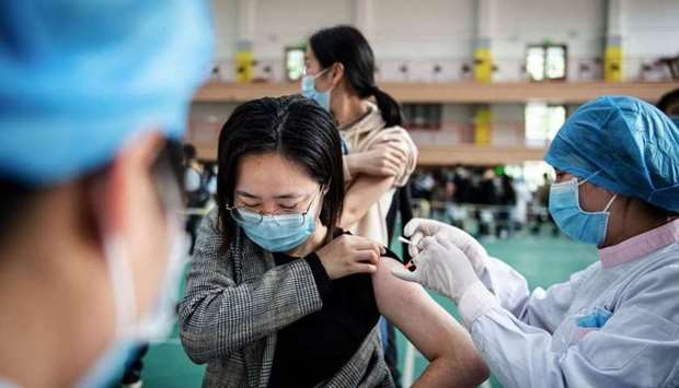 A university student receiving the China National Biotec Group Covid-19 coronavirus vaccine at a university in Wuhan, in China's central Hubei province on on April 28.
