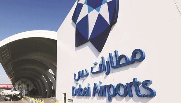 The corporate logo of Dubai Airports is seen at terminal three of Dubai International Airport. The airport handled 5.75mn passengers in the first quarter, a 67.8% fall compared to the same quarter in 2020 before the pandemic halted traffic.