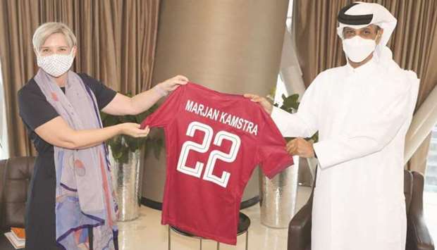 Qatar Football Association president Sheikh Hamad bin Khalifa bin Ahmed al-Thani (left) with Marjan Kamstra, ambassador of the Netherlands to Qatar.