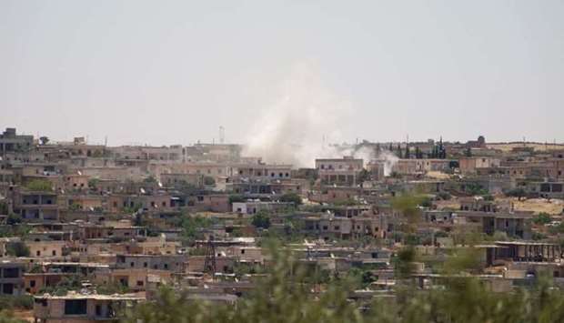 Smoke billows following reported bombardment by government forces in the Syrian northwestern town of Barah, in the Jabal al-Zawiya region of the rebel-held Idlib province