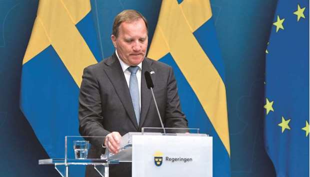 Prime Minister Stefan Loefven pauses at a news conference after the vote in Stockholm yesterday. (AFP)