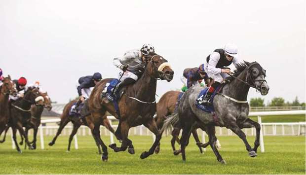 Ronan Whelan (right) rides Sonaiyla to victory in the Qatar Racing And Equestrian Club Ballyogan Stakes (Group 3) in Curragh, Ireland, on Wednesday. (Racing Post)