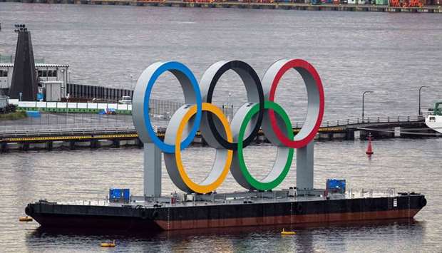 A general view shows the Olympic rings on the Odaiba waterfront in Tokyo