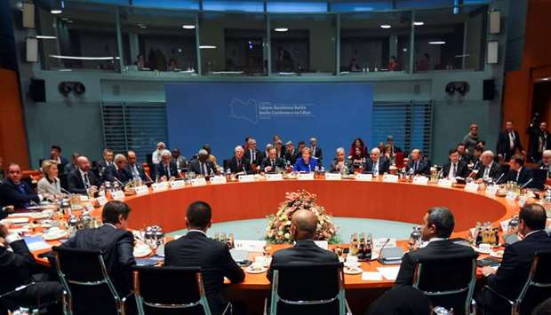(files) This file photo taken on January 19, 2020 shows a general view of participants attending the Peace summit on Libya at the Chancellery in Berlin. 