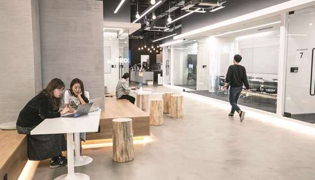 Viva Republica employees work at the companyu2019s office in Seoul. Viva Republica, operator of South Koreau2019s largest fintech startup Toss, raised more than $400mn at a $7.4bn value, to help the super app grow sales 12-fold by 2025 as it heads for a potential initial public offering.