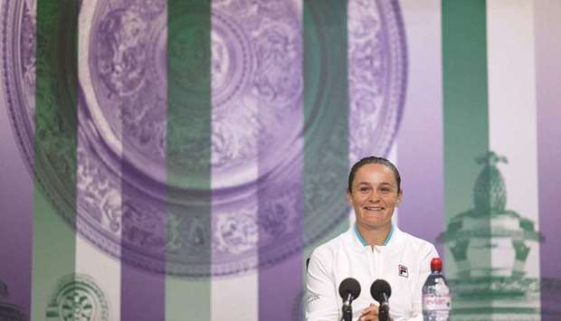 Australiau2019s Ashleigh Barty attends a press conference at The All England Tennis Club in Wimbledon.