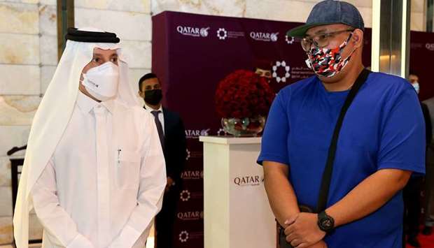 HE Akbar al-Baker marking Day of the Seafarer with others.