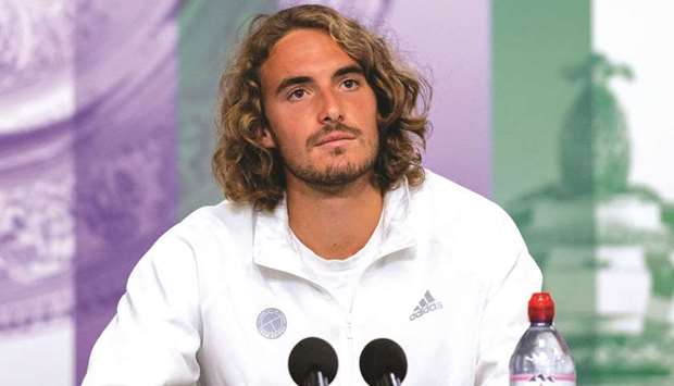 Greeceu2019s Stefanos Tsitsipas addresses a press conference ahead of the Wimbledon Championships at All England Lawn Tennis and Croquet Club in London yesterday. (Reuters)