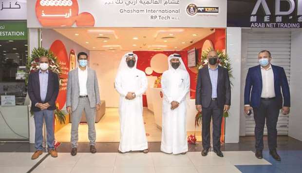 Officials at the new Express shop.