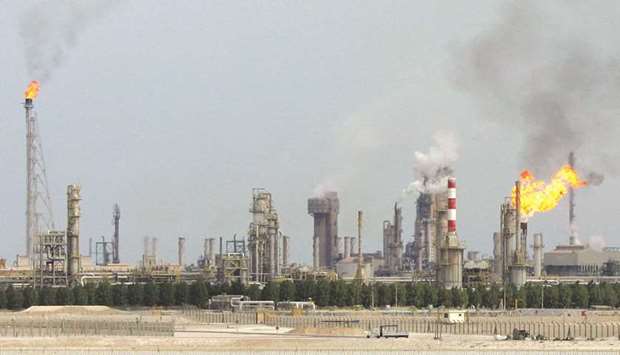The file photo taken on February 1, 2006 shows an oil refinery on the outskirts of Doha. The mining PPI, which carries the maximum weight of 72.7%, reported a robust 117.2% surge year-on-year in May 2021 as the selling price of crude petroleum and natural gas was seen soaring a huge 117.9%, according to PSA data.