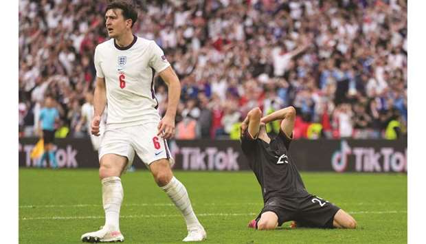 Germanyu2019s forward Thomas Mueller (right) reacts to missing a goal opportunity during the Euro 2020 round of 16 match against England at Wembley Stadium in London. (AFP)