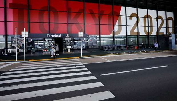 Tokyo 2020 Olympic and Paralympic Games advertisements are displayed at Narita international airport