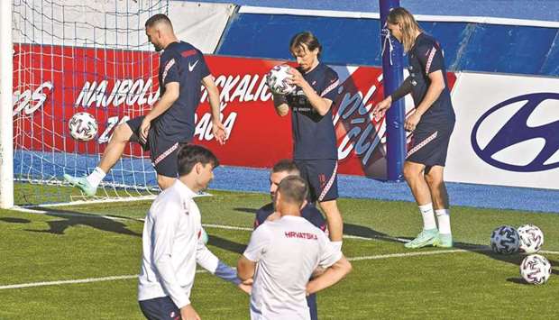 Croatiau2019s Luka Modric (centre) attends a training session with teammates at the Maksimir Stadium yesterday, as part of the preparations for Euro 2020. (AFP)