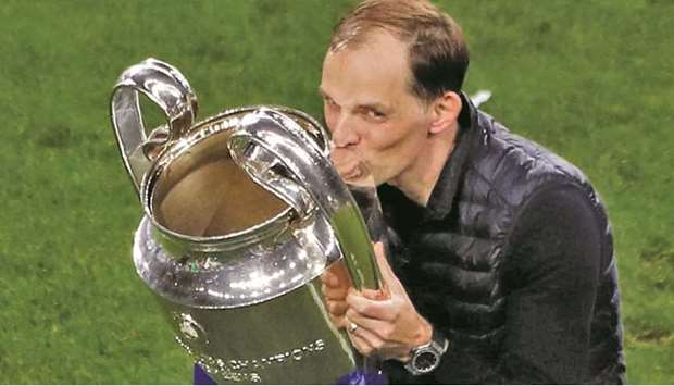 Chelsea manager Thomas Tuchel celebrates with the trophy after winning the Champions League on May 29. (Reuters)