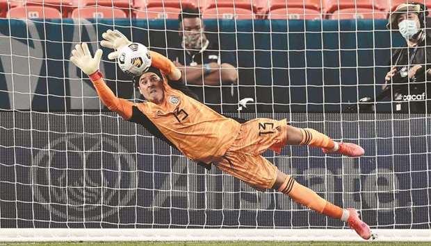 Mexico goalkeeper Guillermo Ochoa makes a save against Costa Rica during the semi-finals of the 2021 CONCACAF Nations League in Denver, Colorado, on Thursday. (AFP)