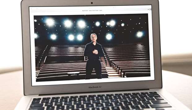 Tim Cook, chief executive officer of Apple, speaks during the Apple Worldwide Developers Conference seen on a laptop computer in Arlington, Virginia (file). Apple will debut major software updates for the iPhone and iPad at its developersu2019 conference next week to an audience that has grown increasingly critical of the companyu2019s App Store policies.