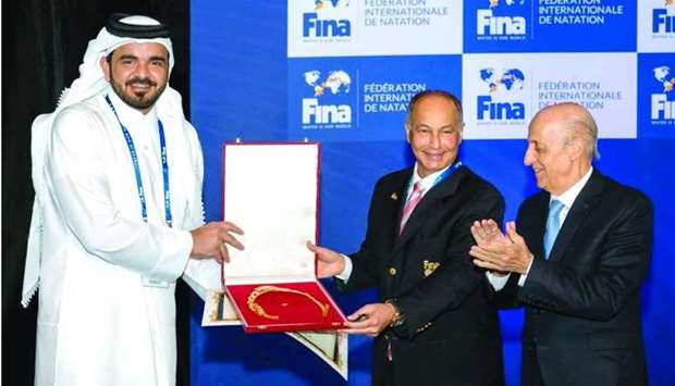 Qatar Olympic Committee President HE Sheikh Joaan bin Hamad al-Thani with Kuwait's Husain al-Mussalam, the newly-elected President of world swimming body FINA, at the Doha Sheraton Hotel Saturday. Al-Mussalam, a former swimmer himself, took over from Uruguay's Julio Maglione (first from right), who stepped down from the president's role after 12 years.