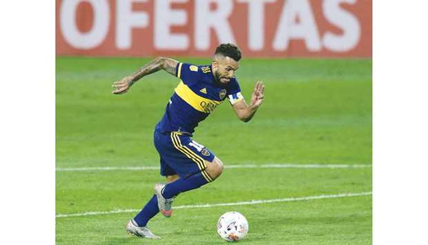 Boca Juniorsu2019 forward Carlos Tevez drives the ball during the Argentine Professional Football League match against Atletico Tucuman in Buenos Aires on April 17.  (AFP)
