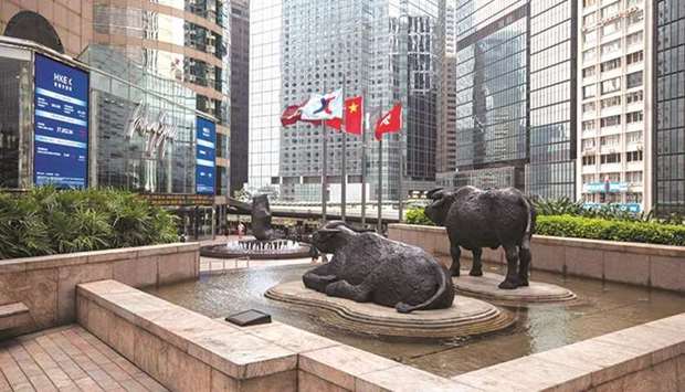 Sculptures stand outside the Hong Kong Stock Exchange. New Hong Kong listings are tracking at their slowest pace since the aftermath of the global financial crisis, as weaker markets and Chinau2019s clampdown on its biggest tech firms chill sentiment.