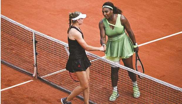 Serena Williams of the US (R) congratulates Kazakhstanu2019s Elena Rybakina at the end of their fourth round match at the French Open yesterday.