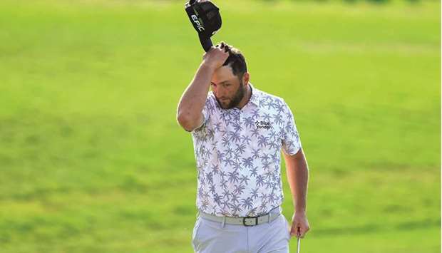 Jon Rahm reacts as he walks off the 18th green after completing his third round of The Memorial Tournament at Muirfield Village Golf Club in Dublin, Ohio. (Getty Images/AFP)