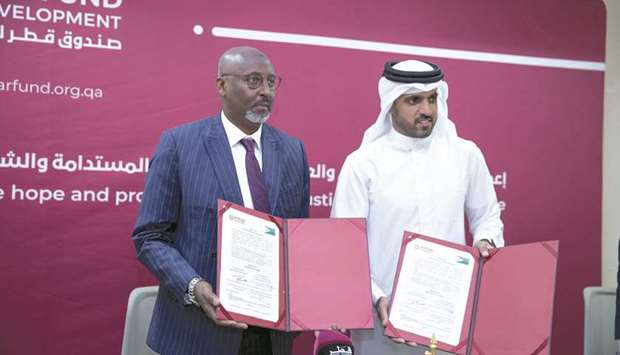 Djiboutiu2019s Minister of National Education and Vocational Training Moustapha Mohamed Mahamoud and QFFD director general Khalifa bin Jassim al-Kuwari at the MoU signing ceremony.