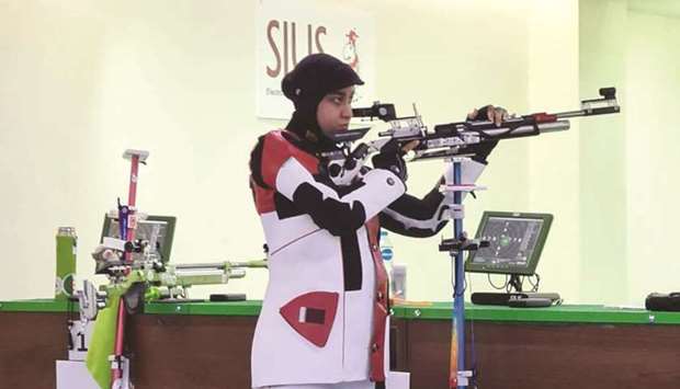 Qatari shooter Aisha al-Suwaidi in action during the 10m air rifle competition at the Arab shooting Championships in Cairo on Tuesday.