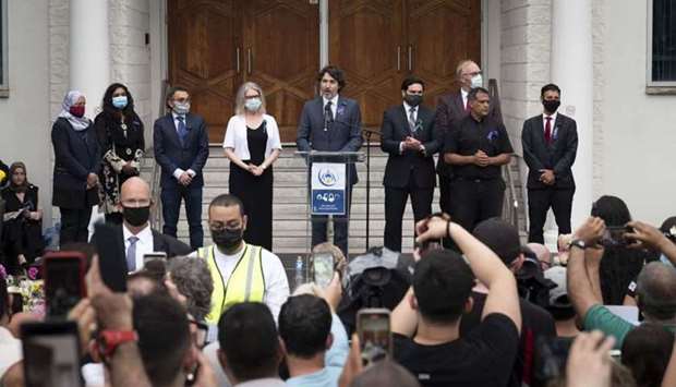 Canadian Prime Minister Justin Trudeau addresses members of the Muslim community and supporters during a vigil at the London Muslim Mosque in London, Canada