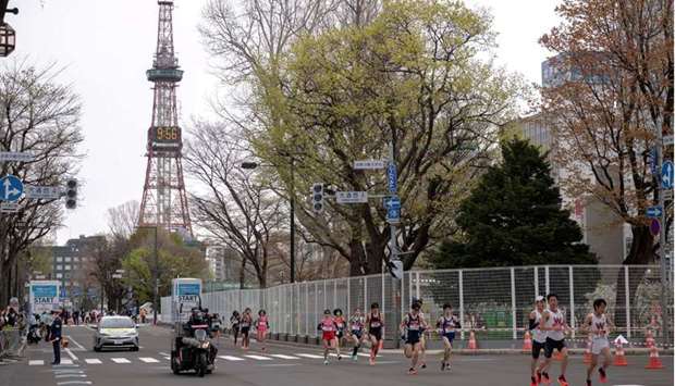 Athletes compete at the half-marathon race which doubles as a test event for the 2020 Tokyo Olympics, in Sapporo, Japan