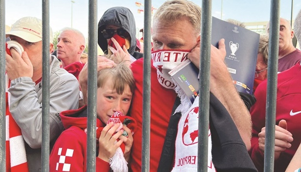 Liverpool fans react as they queue to access Stade de France in Paris before Champions League Final on May 28. (Reuters)