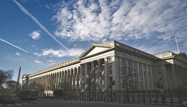 The US Treasury building in Washington, DC. US Treasuries tumbled in one of biggest selloffs of recent decades, driving the yields on 2- and 5-year notes to the highest since 2008, after an unexpected uptick in inflation increased speculation the Federal Reserve will need to raise interest rates more aggressively over the next few months.