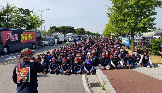Members of the Cargo Truckers Solidarity union attend a protest in Ulsan, South Korea on June 10. REUTERS
