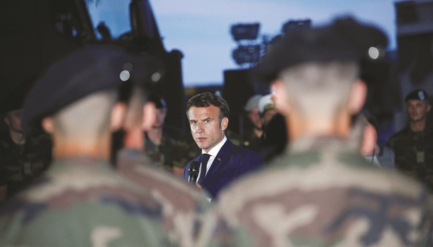 French President Emmanuel Macron speaks to soldiers of the Nato Response Force as part of Mission AIGLE, upon his arrival at the Mihail Kogalniceanu Air Base, near Constanta, Romania yesterday. (Reuters)