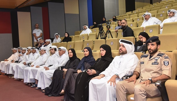  UDST president Dr Salem Al-Naemi and CPE director Dr Saheim al-Temimi with those who were honoured at the event.