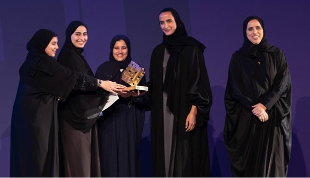 QF Vice-Chairperson and CEO HE Sheikha Hind bint Hamad al-Thani with winners of Akhlaquna Award Tuesday. 