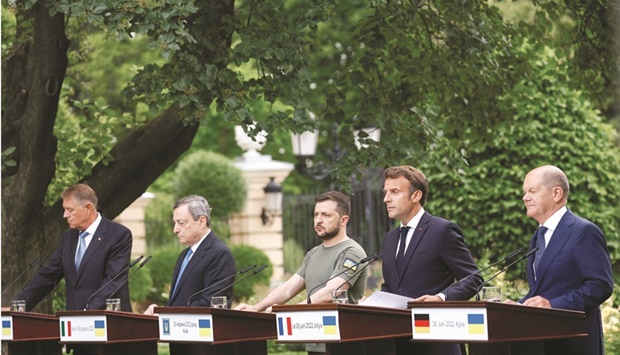 From left: Romanian President Klaus Iohannis, Italian Prime Minister Mario Draghi, Ukrainian President Volodymyr Zelensky, French President Emmanuel Macron and German Chancellor Olaf Scholz during a joint news conference in Kyiv yesterday. (Reuters)