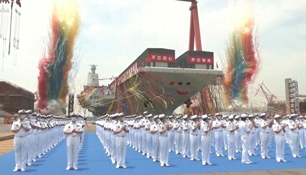 The launch ceremony of the Fujian, a People's Liberation Army aircraft carrier, at a shipyard in Shanghai.  CCTV/AFP