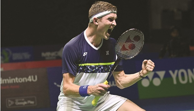 Viktor Axelsen of Denmark reacts after winning against Anthony Sinisuka Ginting of Indonesia during their singles quarter-final at the Indonesia Open badminton tournament in Jakarta yesterday. Axelsen won 21-13, 19-21, 21-9. (AFP)
