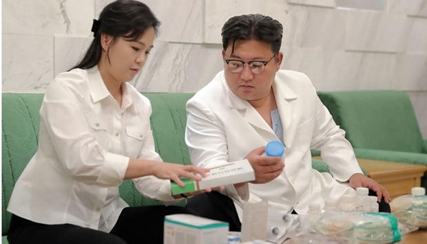 North Korean leader Kim Jong Un and his wife Ri Sol ju send medicines prepared by his family to the Haeju City, South Hwanghae Province as regards the outbreak of an acute enteric epidemic.  KCNA VIA KNS/AFP