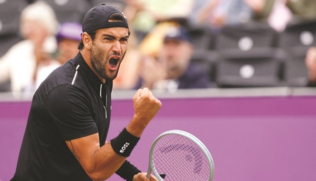 Italyu2019s Matteo Berrettini celebrates after his semi-final win over Netherlandsu2019 Botic Van De Zandschulp at the Queenu2019s Club Championship in London yesterday. (Reuters)