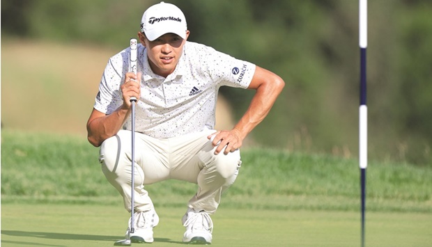 Japanu2019s Collin Morikawa lines up a putt during the second round of the US Open on Friday. (USA TODAY Sports)