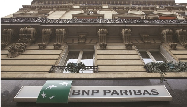 The logo of BNP Paribas sits outside a branch of the bank in Paris. BNP Paribas has expressed interest in a potential acquisition of ABN Amro Bank, the Dutch consumer lender thatu2019s been government-owned since the financial crisis.