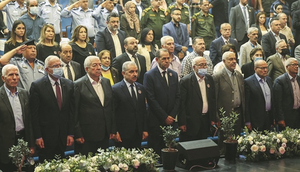 Palestinian Prime Minister Mohamed Shtayeh (centre) attends a memorial ceremony for Shireen Abu Akleh, to mark the 40th day of the killing of the Al Jazeera journalist, in the West Bank city of Ramallah, yesterday.