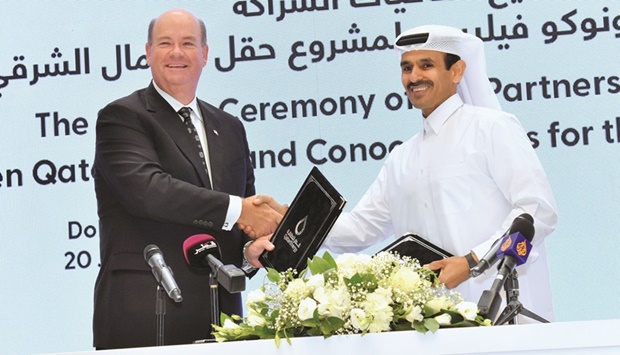 HE the Minister of State for Energy Affairs Saad Sherida al-Kaabi, also the President and CEO of QatarEnergy, and Ryan Lance, Chairman and CEO of ConocoPhillips, at the partnership agreement signing ceremony on Monday in Doha. PICTURE: Thajudheen