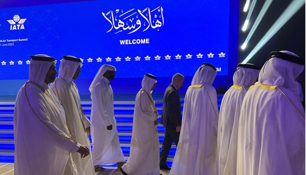 IATA Director General Willie Walsh and Qatar Airways Chief Executive Officer HE Akbar al-Baker walk during the opening of the 78th IATA AGM in Doha on Monday.